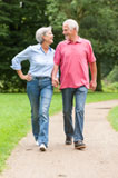Senior Couple Walking ON Path