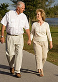 Senior Couple Walking and Holding Hands