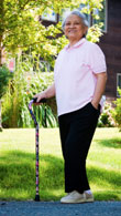 Senior Woman Walking With Cane